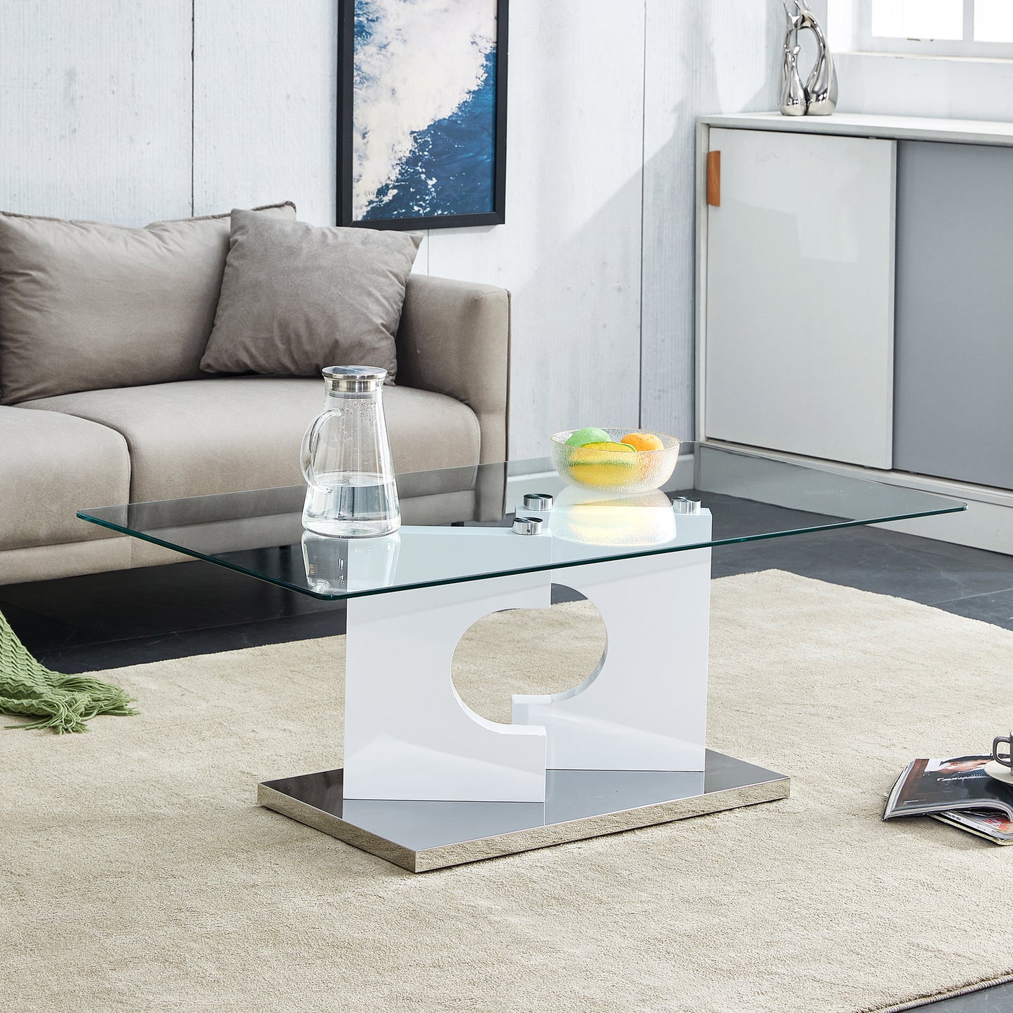 A rectangular modern and fashionable coffee table with tempered glass tabletop and white MDF legs. Suitable for living room.47.2'*25.5'*18'
